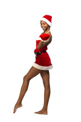 Christmas afro american woman wearing a santa hat smiling