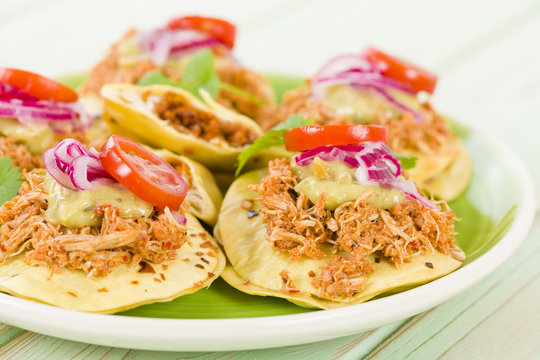 Panuchos - Mexican corn tortillas filled with refried beans