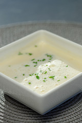 Cream soup with mushrooms in ceramic bowl