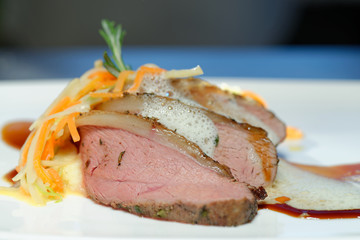 Roast of veal with potatoes and vegetables