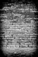 Old room with a brick wall and floor