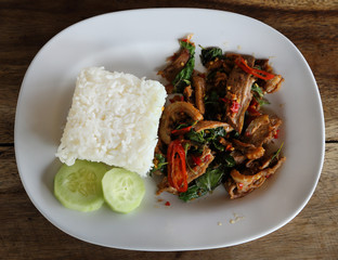Fried pork with sweet basi and white jasmine sticky rice
