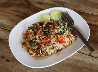 Fried pork with sweet basi and white jasmine sticky rice