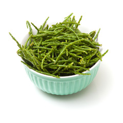 Bowl of Samphire isolated on a white studio background.