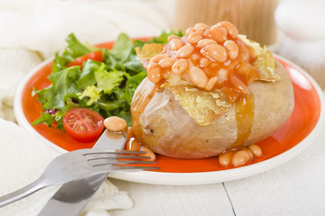 Jacket Potato - Baked potato with baked beans and cheese.