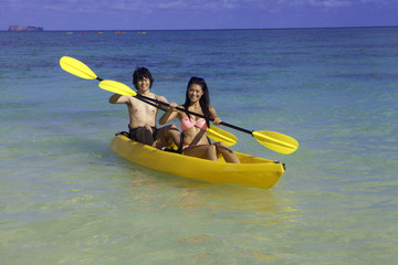 japanese couple in kayak