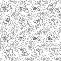 Seamless pattern of black and white flowers.