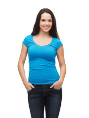 Obraz premium smiling girl in blank blue t-shirt