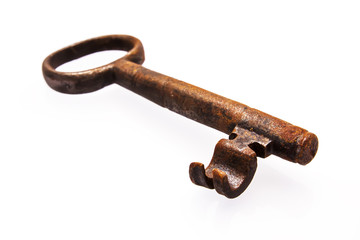 Old rusty key isolated on white background.