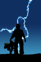 Fototapeta premium Silhouette man holding a saddle by side lighting