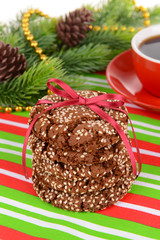 Sweet cookies with cup of tea on table close-up