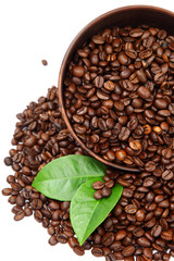 Cup with coffee beans.