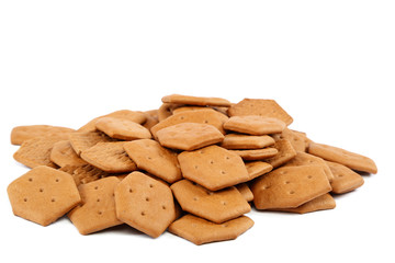 Stack of cracker biscuits on a white background.