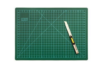green cutting mat on a white background
