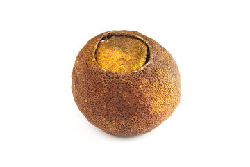 Dried mandarin as a container for tea Pu-erh isolated on white