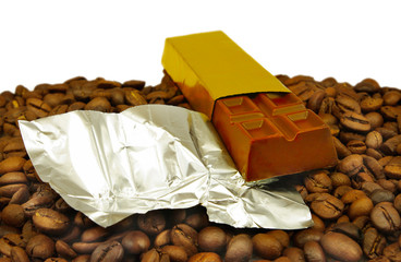 Isolated image of a chocolate bar on coffee beans