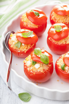 stuffed baked tomatoes with couscous and feta