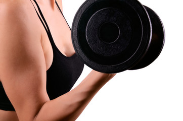 Fototapeta premium athletic woman doing exercises with dumbbells for the biceps