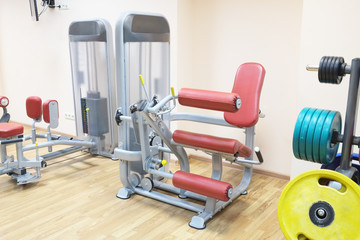 Fototapeta na wymiar Gym apparatus in a gym hall