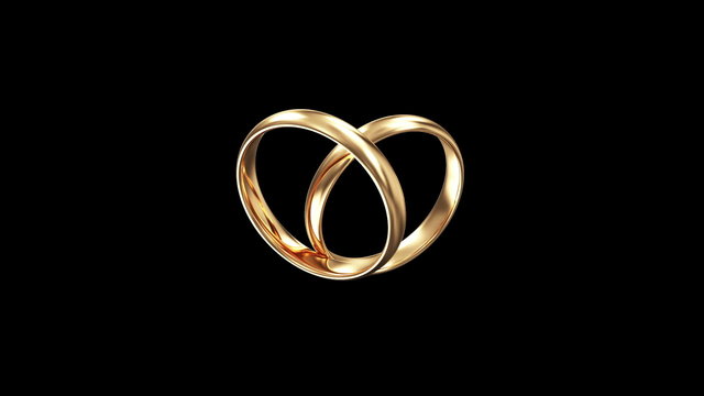 Golden Wedding Rings creating a Heart Form. HQ Video with Alpha