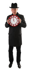 Man is holding clock and showing time