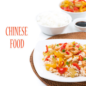 Chinese food - rice with vegetables and shrimps on a plate