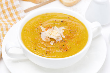 Cream soup of yellow lentils with vegetables, top view