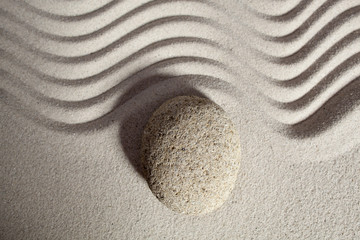 Fototapeta na wymiar silence and tranquility with stone and sand