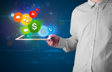 Businessman presenting colorful modern signs