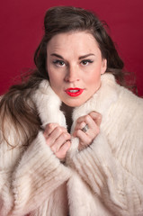 Woman Cuddles in Fur Coat