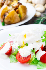 Vegetable salad with poached egg