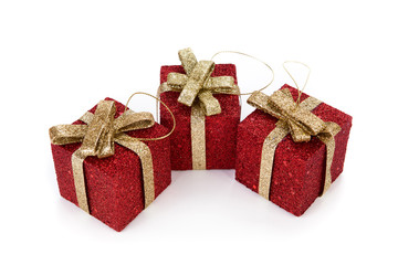 Three artificial red gift boxes