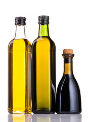 olive oil and vinegar bottles isolated on white