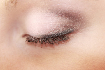 Part of face female eye makeup applying with brush