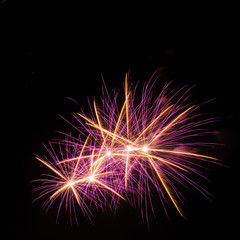 Fototapeta premium colorful fireworks over dark sky background