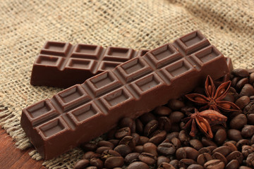 Delicious chocolate bars with coffee beans