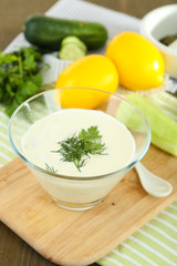 Cucumber yogurt in glass bowl,