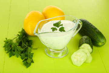 Cucumber yogurt in glass bowl,