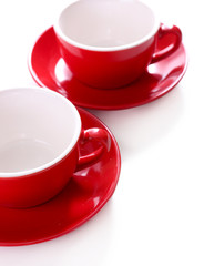 Red cups isolated on white
