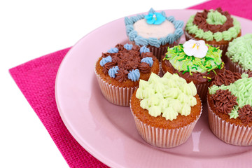 Tasty cupcakes with butter cream,