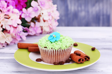Tasty cupcake with butter cream,