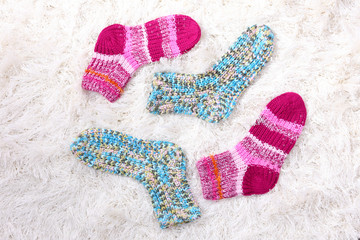 Woolen socks, on color background