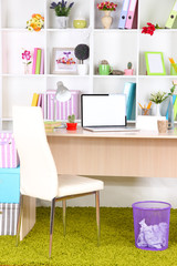 Workplace with laptop, close up