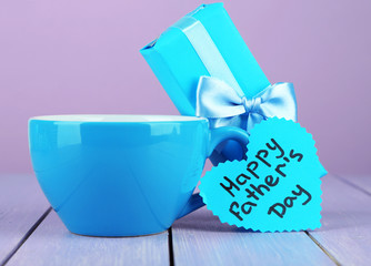 Happy Fathers Day tag with gift box and cup,