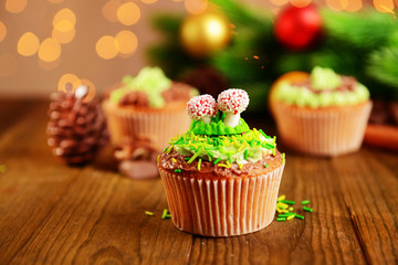 Tasty cupcakes with butter cream,
