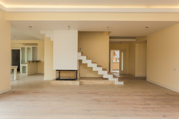 Modern fireplace in new empty house
