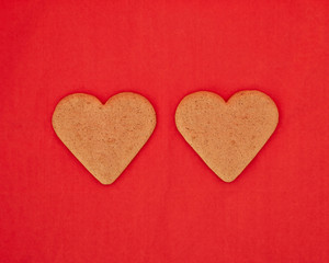 Obraz premium a couple of homemade heart shaped cookies