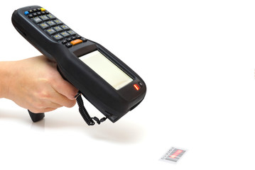 woman hold bar code scanner and scans  with laser