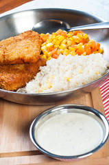 deep fried dory with corn and carrots and tartar sauce