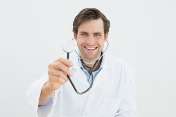 Portrait of a smiling male doctor with stethoscope